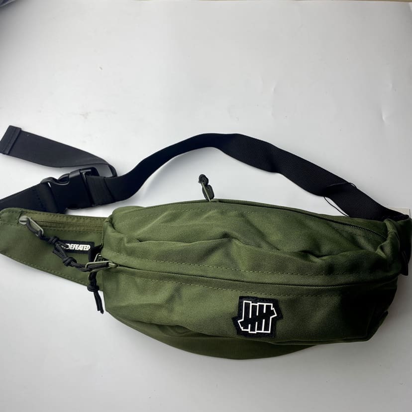 Undefeated Five-Stroke Armband Crossbody Bag