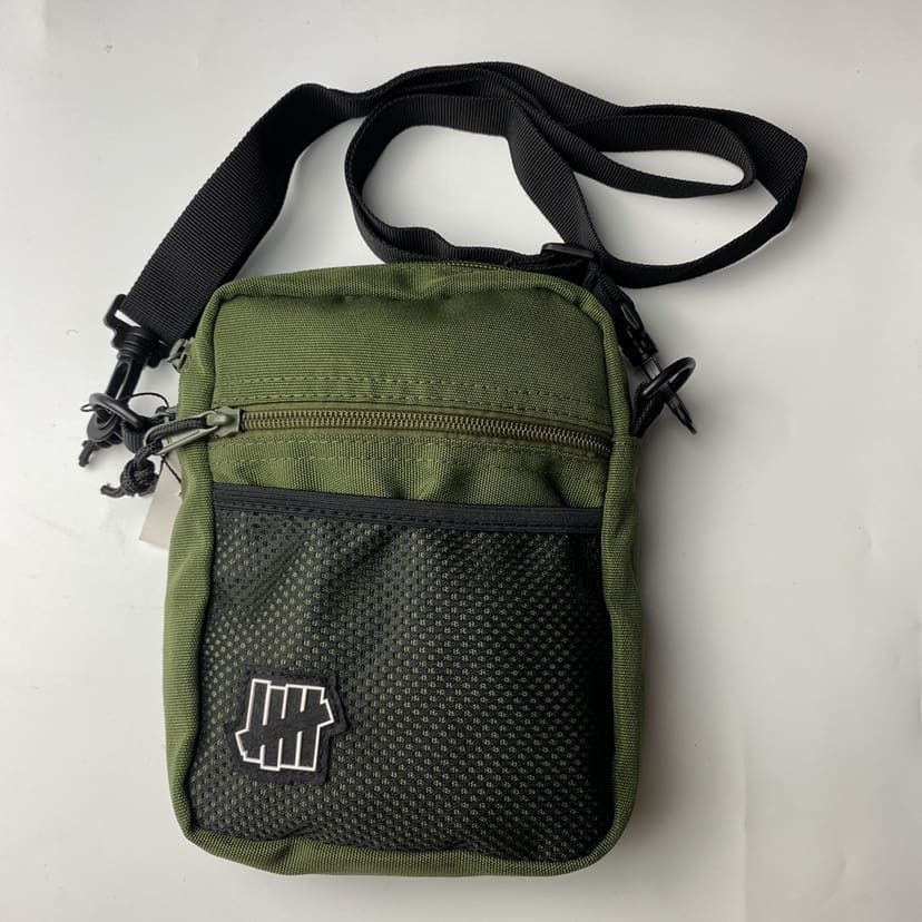 Undefeated Five-Stroke Armband Crossbody Bag